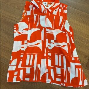 CAbi Vibrant Orange and Cream Top